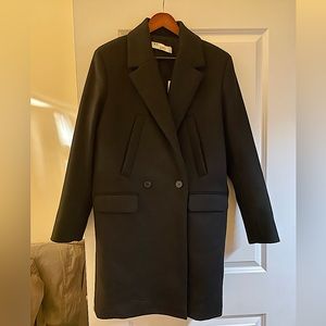 Never worn, plenty of weight for the cold. Size is European, 48 (XL)